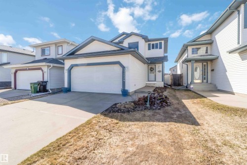 Two-story residence featuring light-colored siding with dark trim accents - 17224 83 Street, Edmonton, AB - Outdoor With Facade
