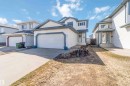 Two-story residence featuring light-colored siding with dark trim accents - 17224 83 Street, Edmonton, AB  - Outdoor With Facade 
