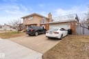 Split-level residence featuring a stucco and brick exterior - 16424 106 Street, Edmonton, AB  - Outdoor 