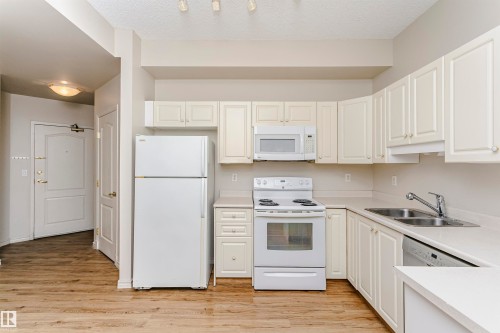 1701 10649 Saskatchewan Drive, Edmonton, AB - Indoor Photo Showing Kitchen With Double Sink
