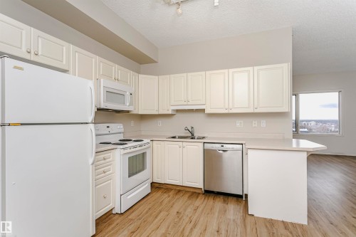 1701 10649 Saskatchewan Drive, Edmonton, AB - Indoor Photo Showing Kitchen With Double Sink