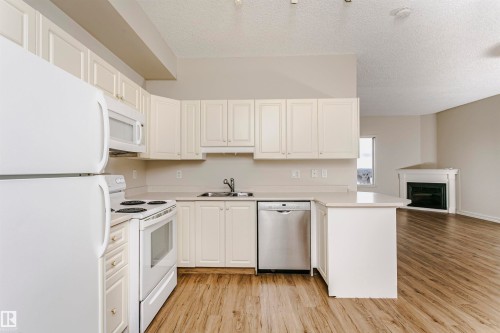 1701 10649 Saskatchewan Drive, Edmonton, AB - Indoor Photo Showing Kitchen With Double Sink