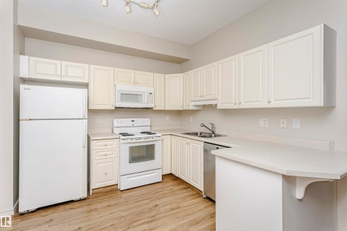 1701 10649 Saskatchewan Drive, Edmonton, AB - Indoor Photo Showing Kitchen With Double Sink