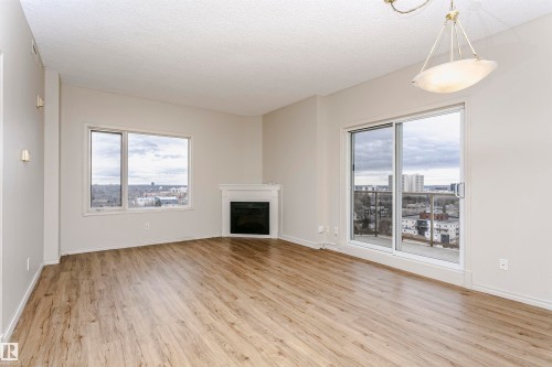 1701 10649 Saskatchewan Drive, Edmonton, AB - Indoor Photo Showing Living Room With Fireplace