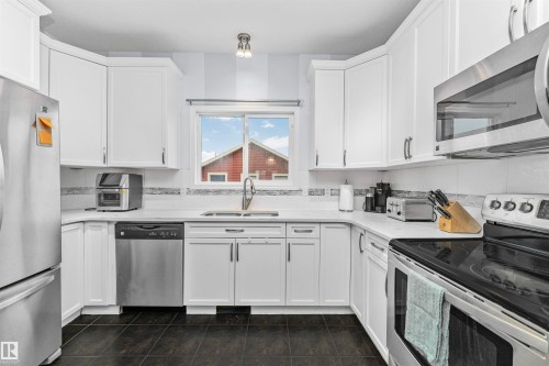 4613 Crabapple Run Run, Edmonton, AB - Indoor Photo Showing Kitchen With Double Sink