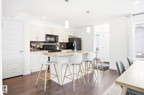 2061 Trumpeter Way, Edmonton, AB - Indoor Photo Showing Kitchen With Upgraded Kitchen