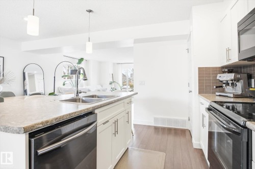 2061 Trumpeter Way, Edmonton, AB - Indoor Photo Showing Kitchen With Double Sink With Upgraded Kitchen