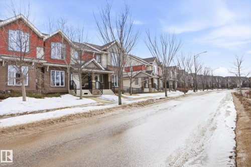 2061 Trumpeter Way, Edmonton, AB - Outdoor With Facade