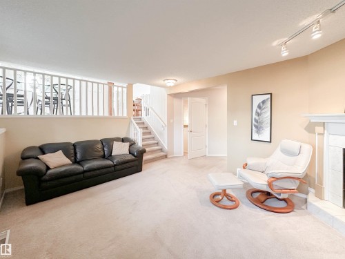 67 Arcand Drive, St. Albert, AB - Indoor Photo Showing Living Room With Fireplace