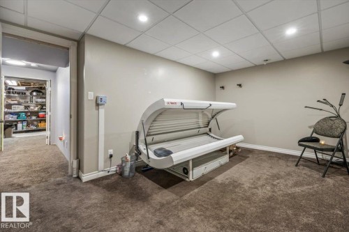Carpeted room with recessed lighting and a drop ceiling - 6003 176 Street, Edmonton, AB - Indoor