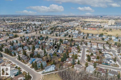 Residential neighborhood featuring extensive tree coverage, varied architectural styles, and established streetscapes - 6003 176 Street, Edmonton, AB - Outdoor With View