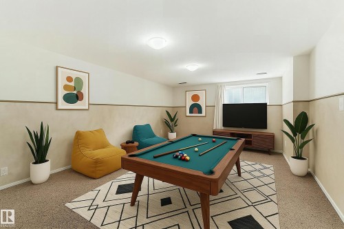 The entertainment area features recessed lighting, a window with blinds, and carpeted floors - 4224 30 Street, Edmonton, AB - Indoor Photo Showing Other Room