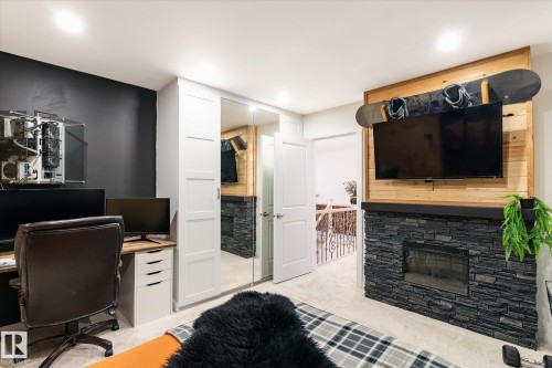 5016 44 Ave, Calmar, AB - Indoor Photo Showing Office With Fireplace