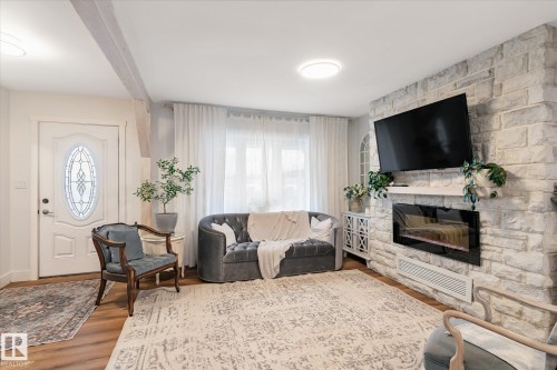 5016 44 Ave, Calmar, AB - Indoor Photo Showing Living Room With Fireplace