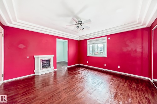 5204 112 Avenue, Edmonton, AB - Indoor Photo Showing Other Room With Fireplace