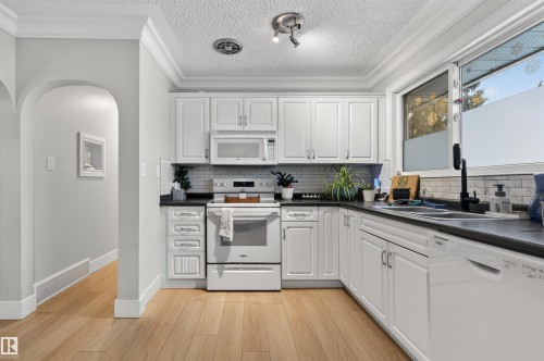 16 Mural Crescent, St. Albert, AB - Indoor Photo Showing Kitchen With Double Sink