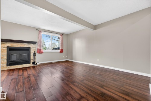 1556 69 Street, Edmonton, AB - Indoor Photo Showing Other Room With Fireplace