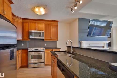 906 9020 Jasper Avenue, Edmonton, AB - Indoor Photo Showing Kitchen With Double Sink