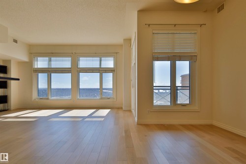 906 9020 Jasper Avenue, Edmonton, AB - Indoor Photo Showing Other Room With Fireplace