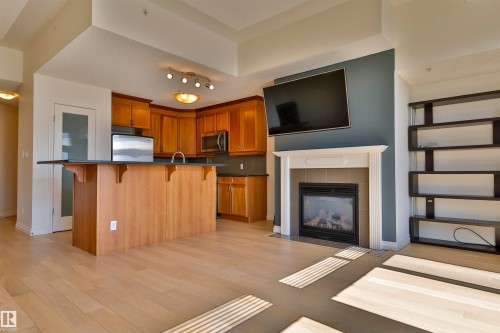 906 9020 Jasper Avenue, Edmonton, AB - Indoor With Fireplace