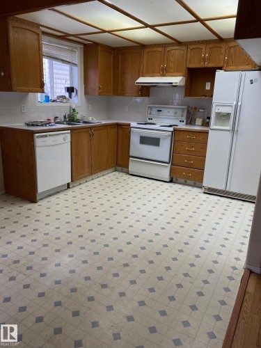 12005 95A Street, Edmonton, AB - Indoor Photo Showing Kitchen With Double Sink