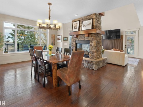 112 Windermere Drive, Edmonton, AB - Indoor Photo Showing Dining Room With Fireplace