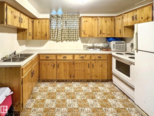 5025 54 Street, Glendon, AB - Indoor Photo Showing Kitchen With Double Sink