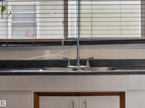 7214 78 Avenue, Edmonton, AB - Indoor Photo Showing Kitchen With Double Sink