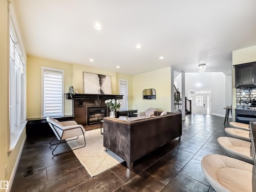 3438 West Landing, Edmonton, AB - Indoor Photo Showing Living Room With Fireplace