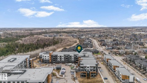 Image quality insufficient for description - 202 7459 May Common, Edmonton, AB - Outdoor With View