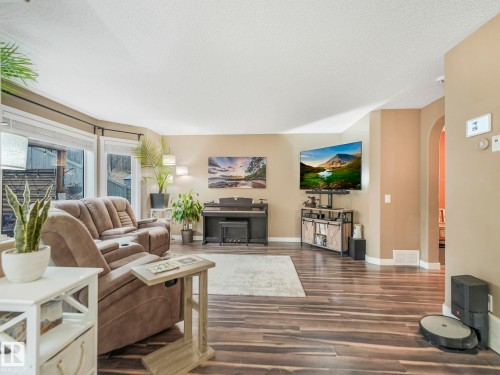 224 Hyndman Crescent, Edmonton, AB - Indoor Photo Showing Living Room With Fireplace