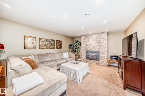 10811 43 Avenue, Edmonton, AB - Indoor Photo Showing Living Room With Fireplace