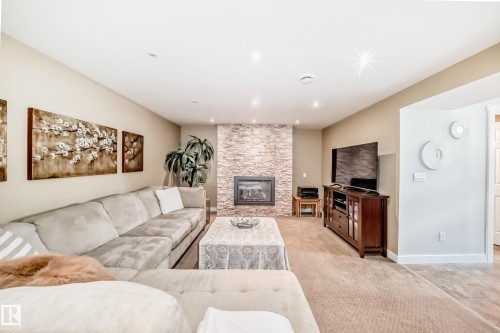 10811 43 Avenue, Edmonton, AB - Indoor Photo Showing Living Room With Fireplace