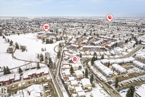 Expansive aerial view of a residential neighborhood with snow-covered rooftops - 70 Stirling Road, Edmonton, AB - Outdoor With View