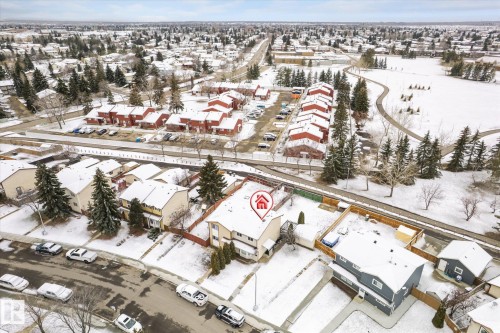 Aerial perspective showcasing a residential area with varied housing styles - 70 Stirling Road, Edmonton, AB - Outdoor With View
