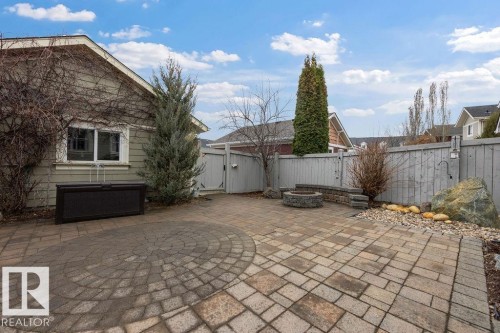 Spacious paver patio with a circular inlay design - 1613 Kerr Road, Edmonton, AB - Outdoor