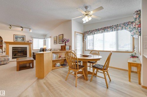 38 Highland Crescent, St. Albert, AB - Indoor Photo Showing Dining Room With Fireplace