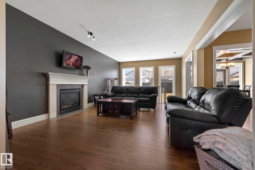 2011 126 Street, Edmonton, AB - Indoor Photo Showing Living Room With Fireplace