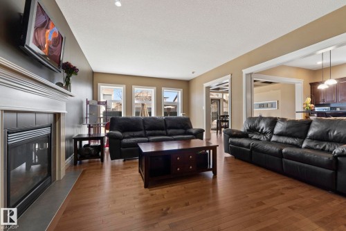 2011 126 Street, Edmonton, AB - Indoor Photo Showing Living Room With Fireplace