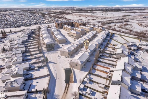 Residential community featuring townhomes and single-family residences - 110 13825 155, Edmonton, AB - Outdoor With View