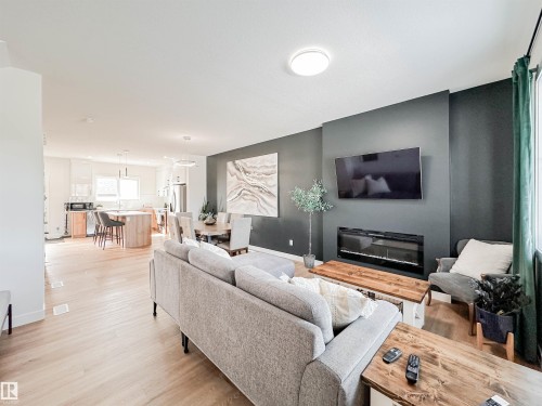 35 Chelles Wynd, St. Albert, AB - Indoor Photo Showing Living Room With Fireplace