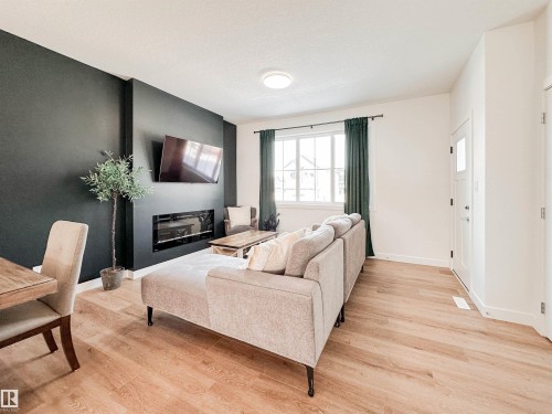 35 Chelles Wynd, St. Albert, AB - Indoor Photo Showing Living Room With Fireplace