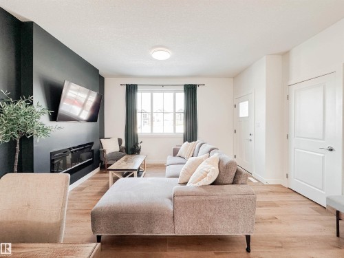 35 Chelles Wynd, St. Albert, AB - Indoor Photo Showing Living Room With Fireplace