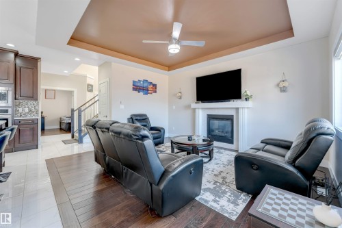 1943 Adamson Terrace, Edmonton, AB - Indoor Photo Showing Other Room With Fireplace