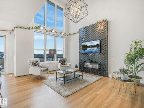 4324 Hawthorn Landing, Edmonton, AB - Indoor Photo Showing Living Room With Fireplace