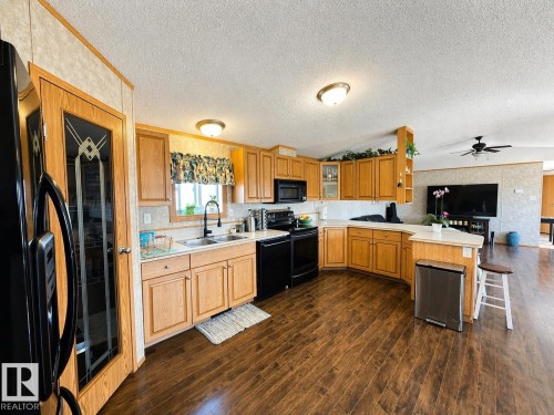 4703 51 Avenue, La Corey, AB - Indoor Photo Showing Kitchen With Double Sink