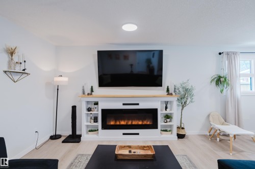 13 Lorraine Crescent, St. Albert, AB - Indoor Photo Showing Living Room With Fireplace