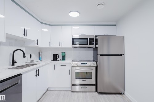 13 Lorraine Crescent, St. Albert, AB - Indoor Photo Showing Kitchen With Double Sink