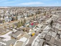 Aerial perspective highlighting a residential property with a green roof, situated within a neighborhood of single-family homes - 11044 166 Avenue, Edmonton, AB  - Outdoor With View 