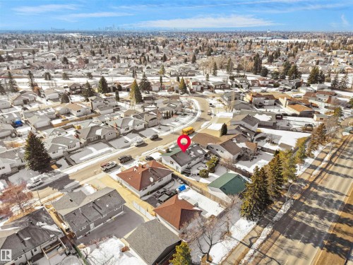 Suburban neighborhood featuring a variety of housing styles and mature tree-lined streets - 11044 166 Avenue, Edmonton, AB - Outdoor With View